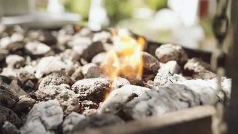 Starting fire in a gril Stock Footage 86062551
