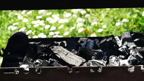 Starting fire in the grill for summer barbecue, slow motion HD  Stock Footage 74604232