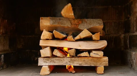 Starting fire to a pile of wood Stock Footage 59642929
