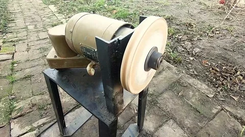 Starting homemade grinding machine Stock Footage 119116304