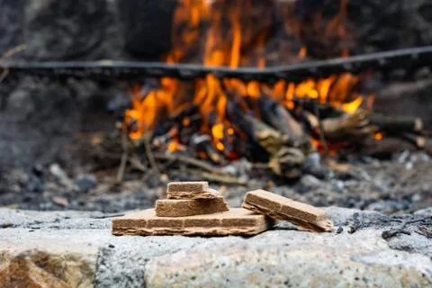 Starting kindling for a fire in the background of a flame. Stock Photos