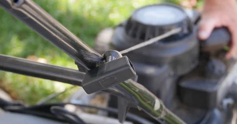 Starting lawn mower Stock Footage 42023317