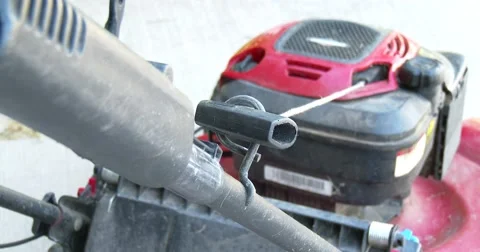 Starting Lawn Mower - Pull Start - 4k Stock Footage 67244666