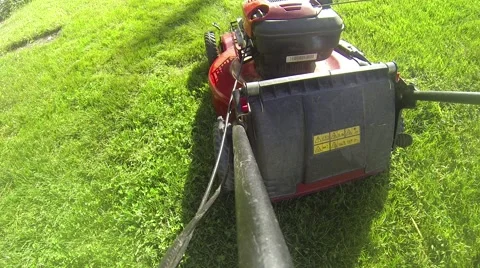 Starting Lawnmower - Mowing Grass - Push Mower Stock Footage 67238369