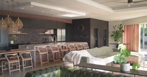 Starting left pan, camera is revealing living kitchen, sofas and island showing Stock Footage 336536154