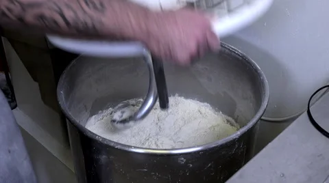 Starting up the machine to knead Stock Footage 56477601
