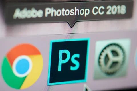 Starting photoshop application on computer Stock Photos