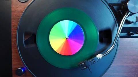 Starting Playback of Green Single 45 RPM Vinyl Record on Turntable, Top Down Stock Footage 334788689