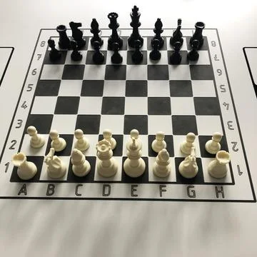 Starting position on 8x8 draughts board chess on the table Stockfoto's