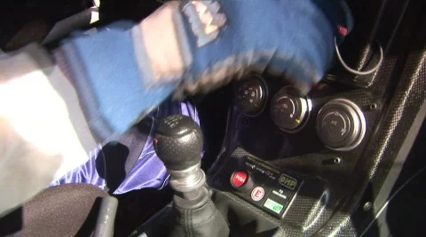 Starting a racing car 2 Stock Footage 123148