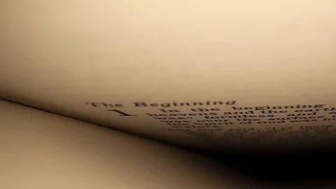 Starting in really close at the very first words of Genesis, "The Stock Footage 128959081