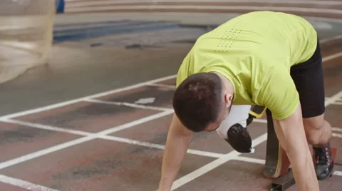 Starting Runner with Prosthetic Legs Stock Footage 62057437