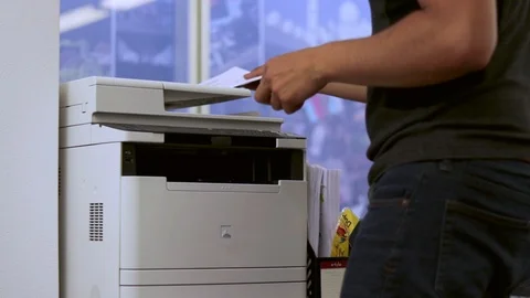 Starting a scan with the multifunction printer on the office 動画素材 95692066