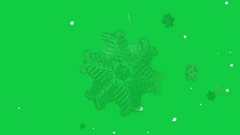 Starting tilt moving hex crystal spinning as small bits drifting showing green Stock Footage 339198014