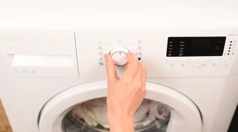 Starting White Modern Washing Machine by Woman Hand Stock Footage 60033038