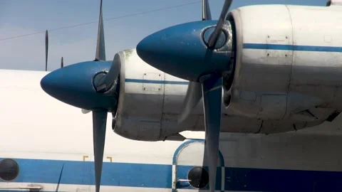 Startingfirst left engine transport aircraft An-12BK  (NATO - Cube) RA-11371. Stock Footage 221834396