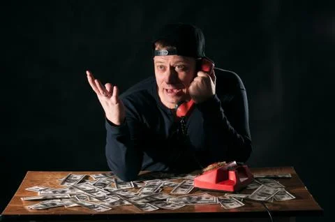 Startled man with phone Stock Photos