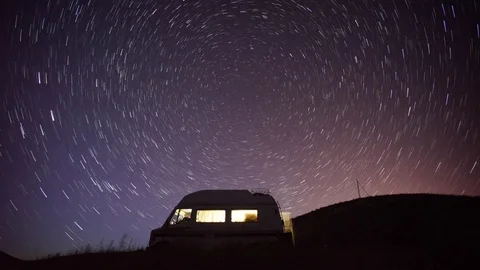 Startrails over the hills Stock Footage 72235568