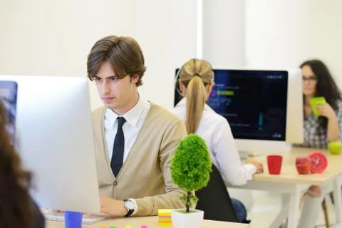 Startup business, software developer with braces working on computer at modern 写真素材