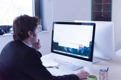 Startup business, software developer working on computer Stock Photos