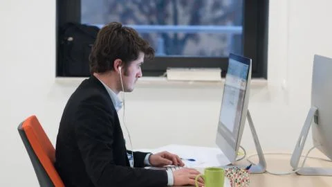 Startup business, software developer working on desktop computer Stock Photos