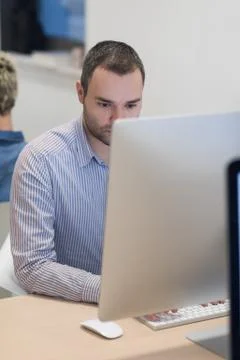 Startup business, software developer working on desktop computer Stock Photos
