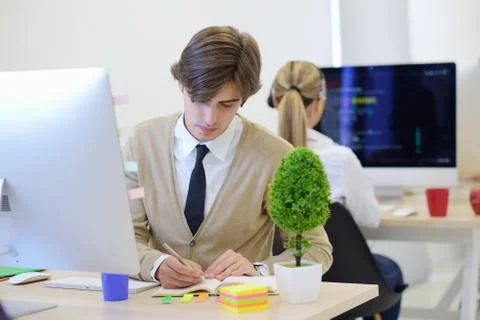 Startup business, software developer working on computer at modern office 스톡 사진