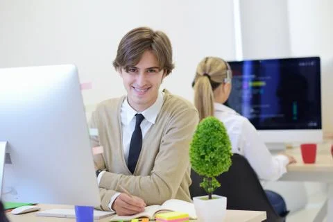 Startup business, software developer working on computer at modern office 库存照片