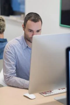 Startup business, software developer working on desktop computer startup b... Stockfoto's