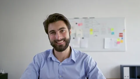 Startup businessman checking documents in office and smiling at camera Video stock 109338468