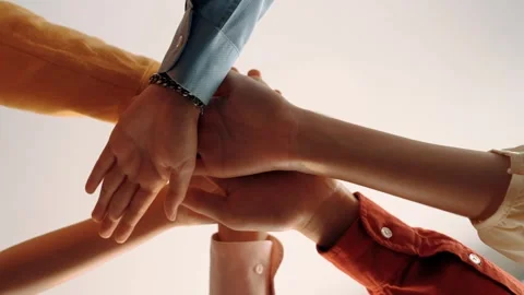 Startup company employee team stack hand together symbolize teamwork. Synergic Stock Footage 279419559
