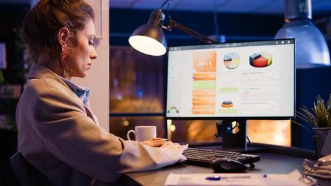 Startup entrepreneur typing data on analytics report 写真素材