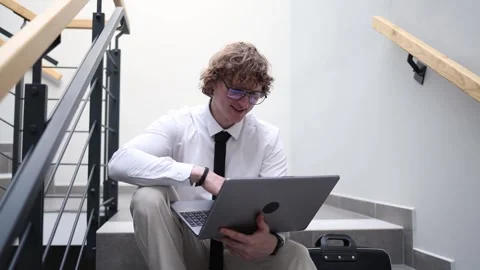 Startup founder reviewing data on laptop in quiet moment Stock Footage 333973744