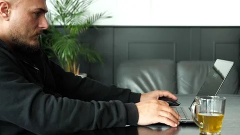 Startup founder working remotely from cozy home office with tea mug Stock Footage 319909615