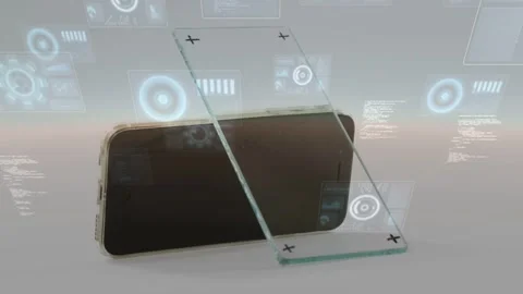 On startup glass panel sliding in front of smartphone, HUDs and code appearing, Stock Footage 332577373