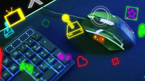 On startup neon overlays animating over wired gaming mouse and keyboard, 库存影片 335465600