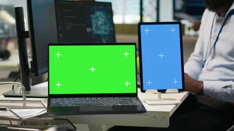 Startup office admin reviewing AI system metrics on isolated screen devices Stock Footage 313164338