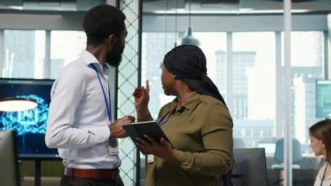 Startup office coworkers doing brainstorming, developing AI models Stock Footage 313017024