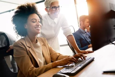 Startup programmer people group working everyday job at modern office Stock-Fotos