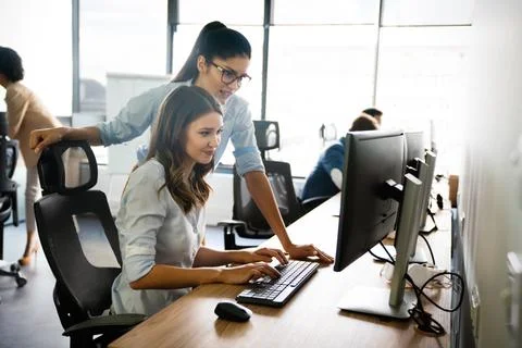 Startup programmer people group working everyday job at modern office Stock-Fotos