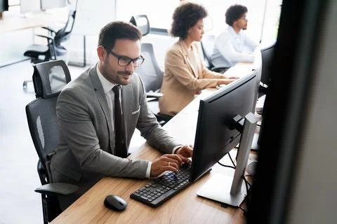 Startup programmer people group working everyday job at modern office Stock-Fotos
