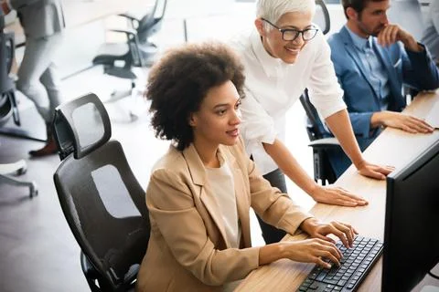 Startup programmer people group working everyday job at modern office Stock-Fotos