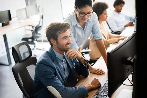 Startup programmer people group working everyday job at modern office Stock-Fotos