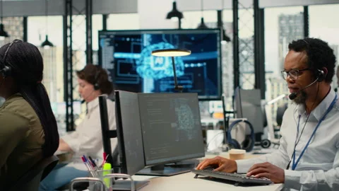 Startup programmers doing tech support, helping users fix errors Stock Footage 323032384