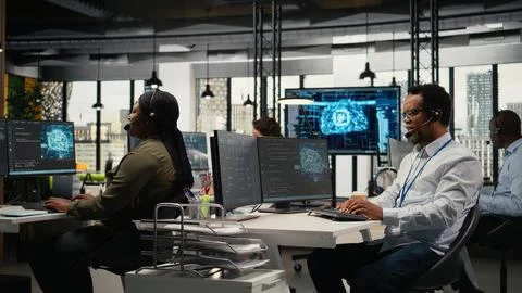 Startup programmers doing tech support, helping users fix errors Stock Photos