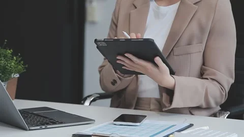 StartUp Programming Team. Website designer working digital tablet dock keyb.. Stock Footage 273381924