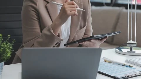 StartUp Programming Team. Website designer working digital tablet dock keyb.. Stock Footage 273381964