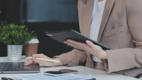 StartUp Programming Team. Website designer working digital tablet dock keyb.. Stock Footage 273382076