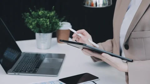 StartUp Programming Team. Website designer working digital tablet dock keyb.. Stock Footage 273505811