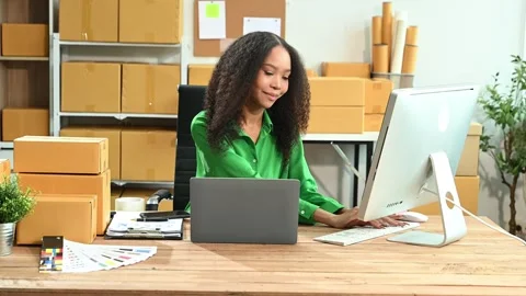 Startup small business SME, Entrepreneur owner woman using smartphone or ta.. Stock Footage 312981553